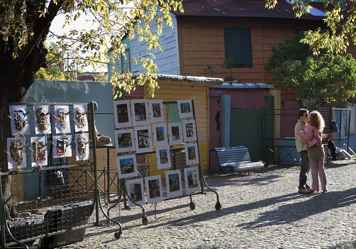 Colourful houses and art stalls along Caminito in La Boca, Buenos Aires