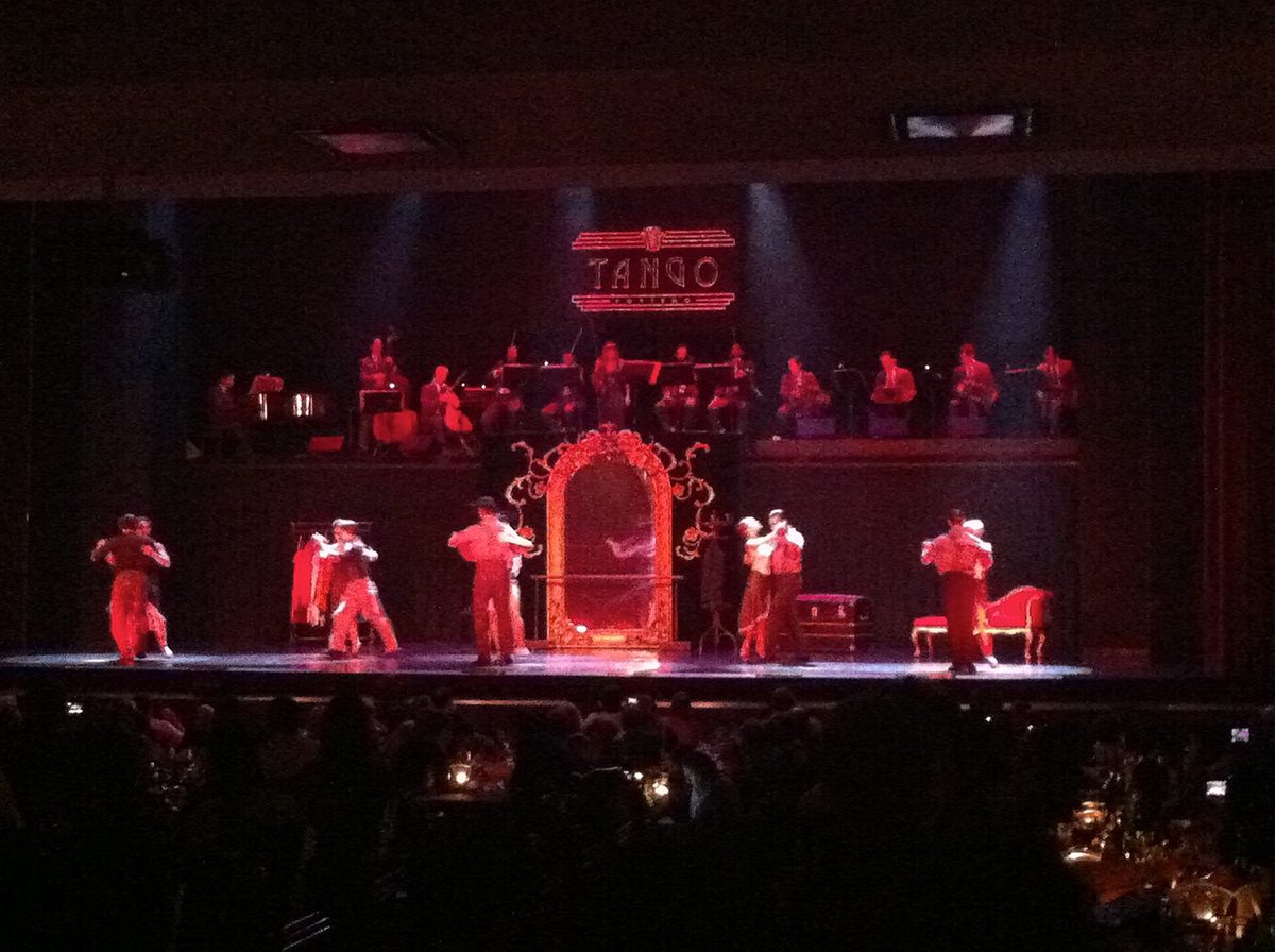 A grand stage tango show in Buenos Aires with a live orchestra