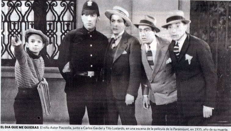 A young Astor Piazzolla with tango legend Carlos Gardel in the 1935 film El dia que me quieras