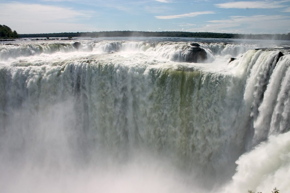 Water thundering over the Garganta del Diablo at Iguazú Falls, a flight from Buenos Aires
