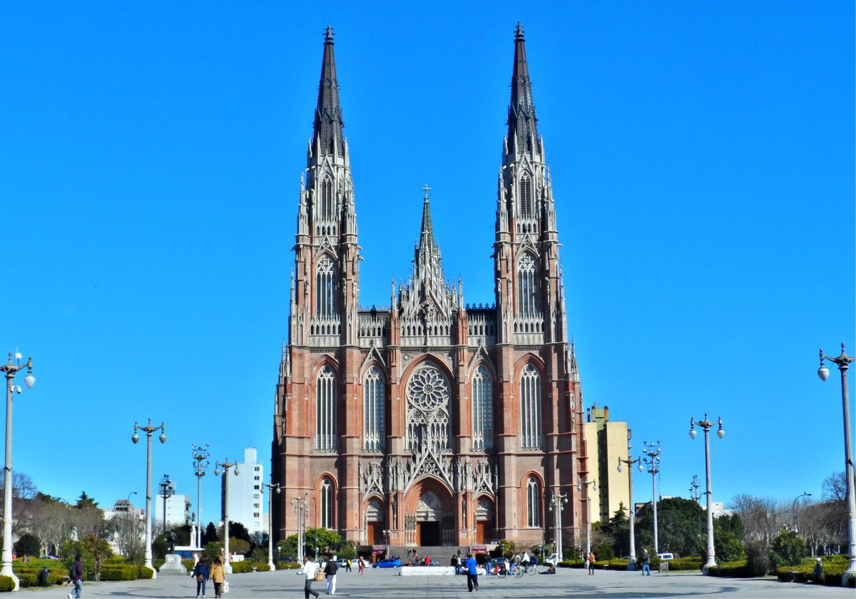 Neo-Gothic twin spires of La Plata Cathedral against a blue sky, an easy day trip from Buenos Aires