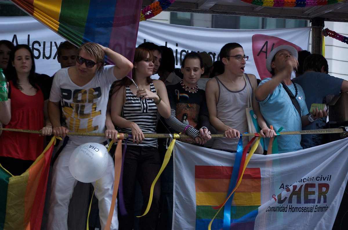 Revelers with rainbow flags at a Buenos Aires Pride event in November