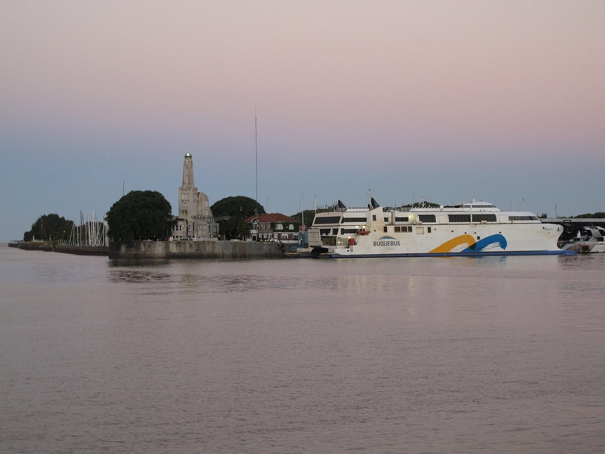 A Buquebus fast catamaran moored at dusk, ready for the buenos aires to uruguay ferry crossing of the Rio de la Plata