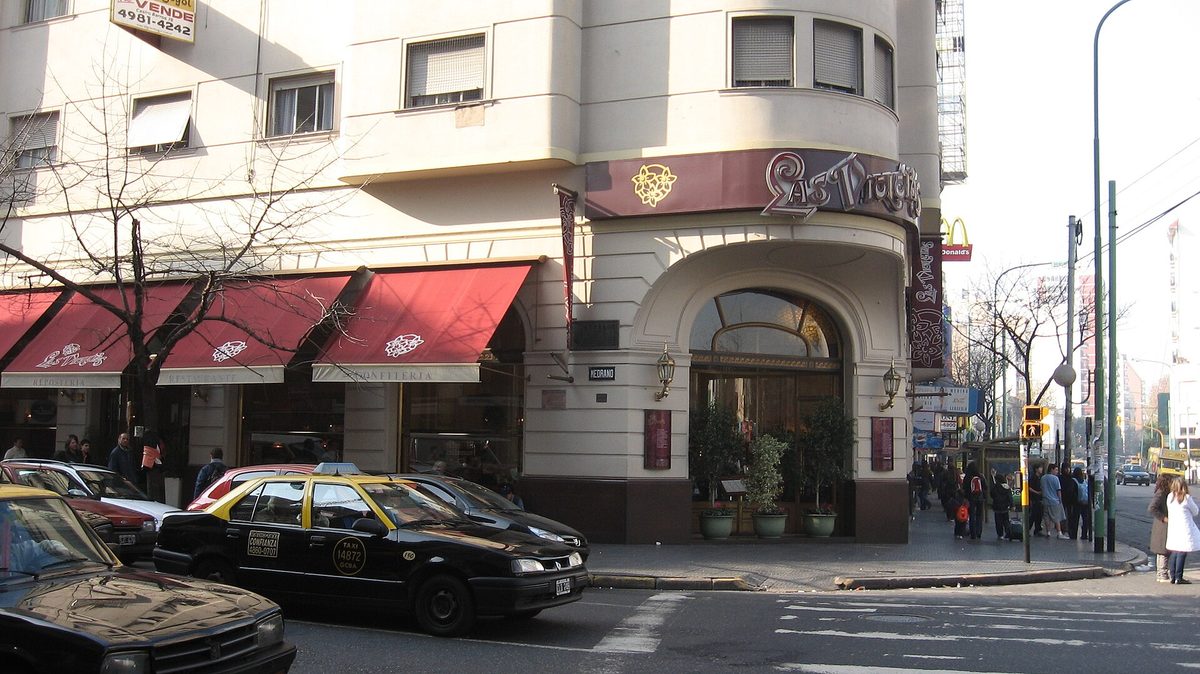 The historic corner exterior of Las Violetas, a heritage confiteria and bar notable in Buenos Aires