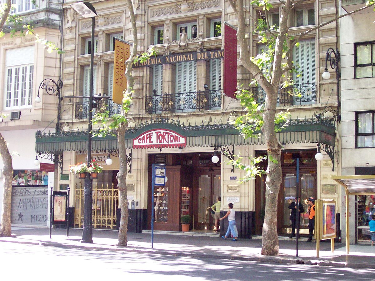 The historic iron and glass facade of Cafe Tortoni on Avenida de Mayo
