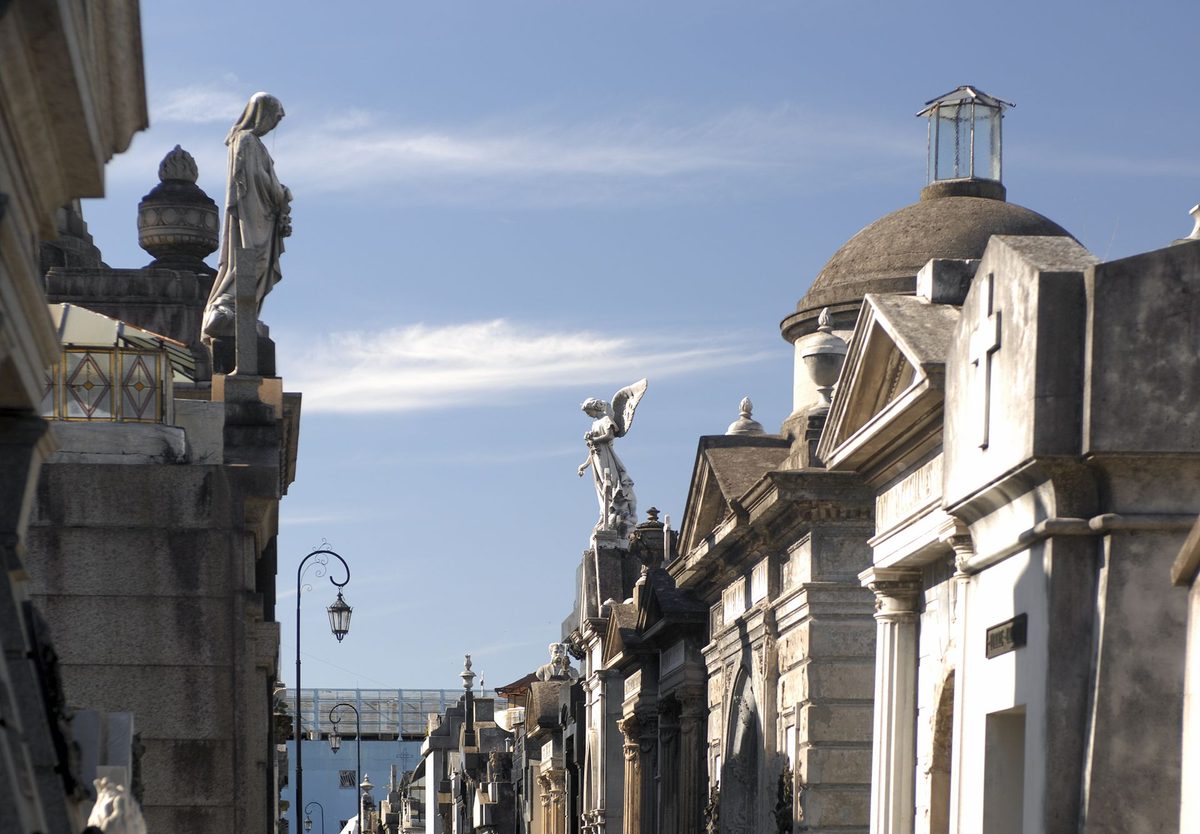 Marble mausoleums lining an avenue inside La Recoleta Cemetery, the landmark beside many hotels in Recoleta Buenos Aires