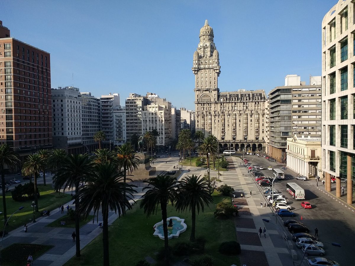 Palacio Salvo and palm-filled Plaza Independencia in central Montevideo