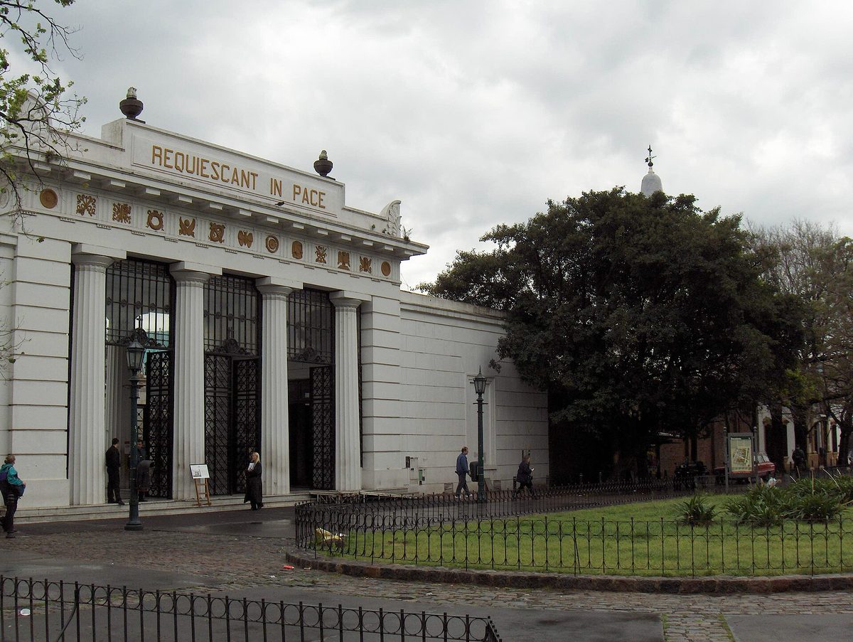 The neoclassical entrance gate to Recoleta Cemetery Buenos Aires seen from Plaza Francia