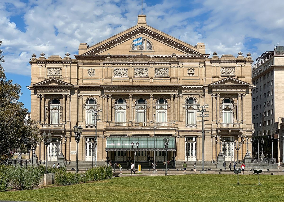 The ornate neoclassical facade of the teatro colon buenos aires opera house seen from Plaza Lavalle