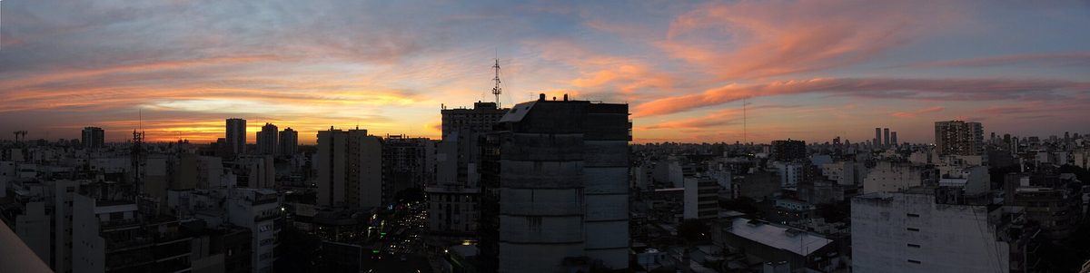 Rooftop sunset view over the low-rise skyline of the Villa Crespo barrio in Buenos Aires