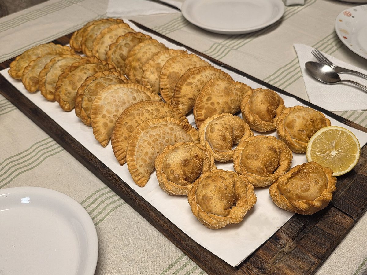 A platter of golden Argentine empanadas, a top pick for what to eat in Buenos Aires